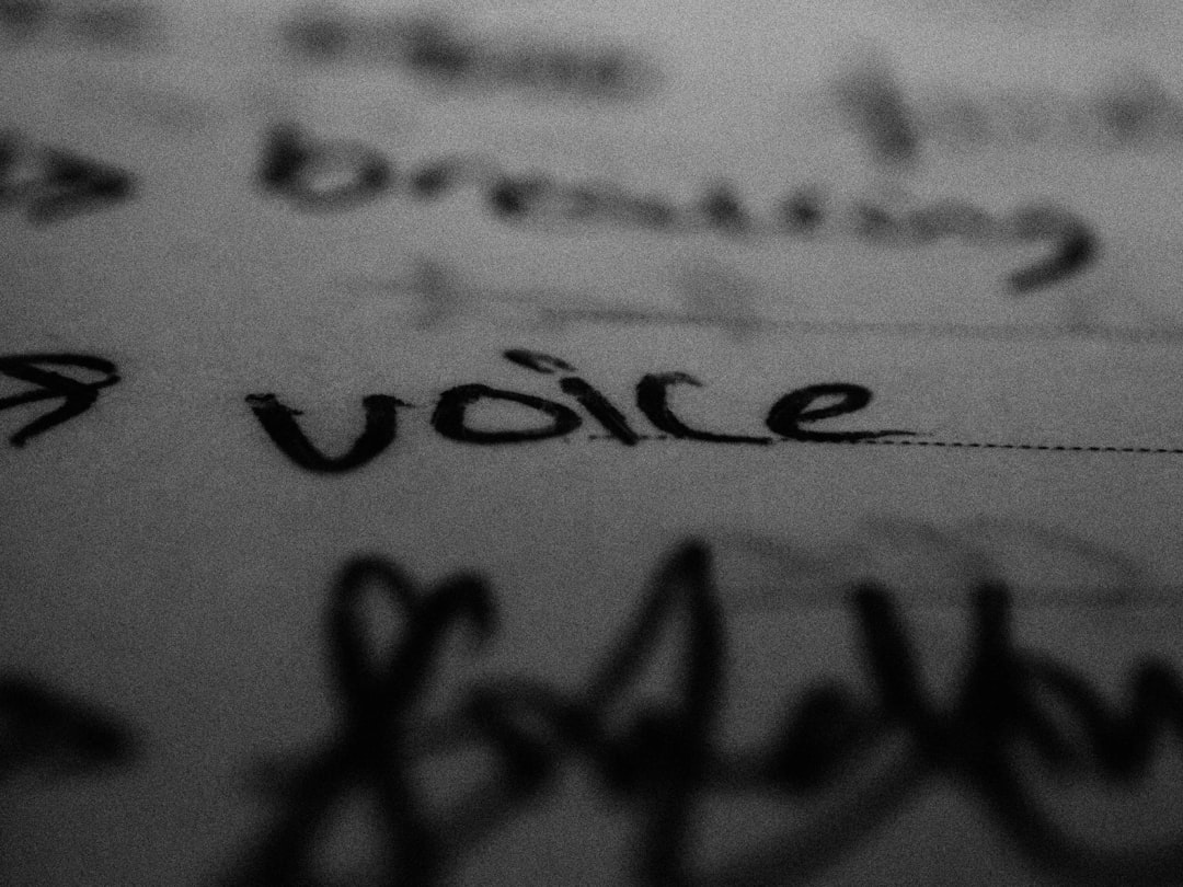 Spanish voice over script writing guide with professional microphone and script pages