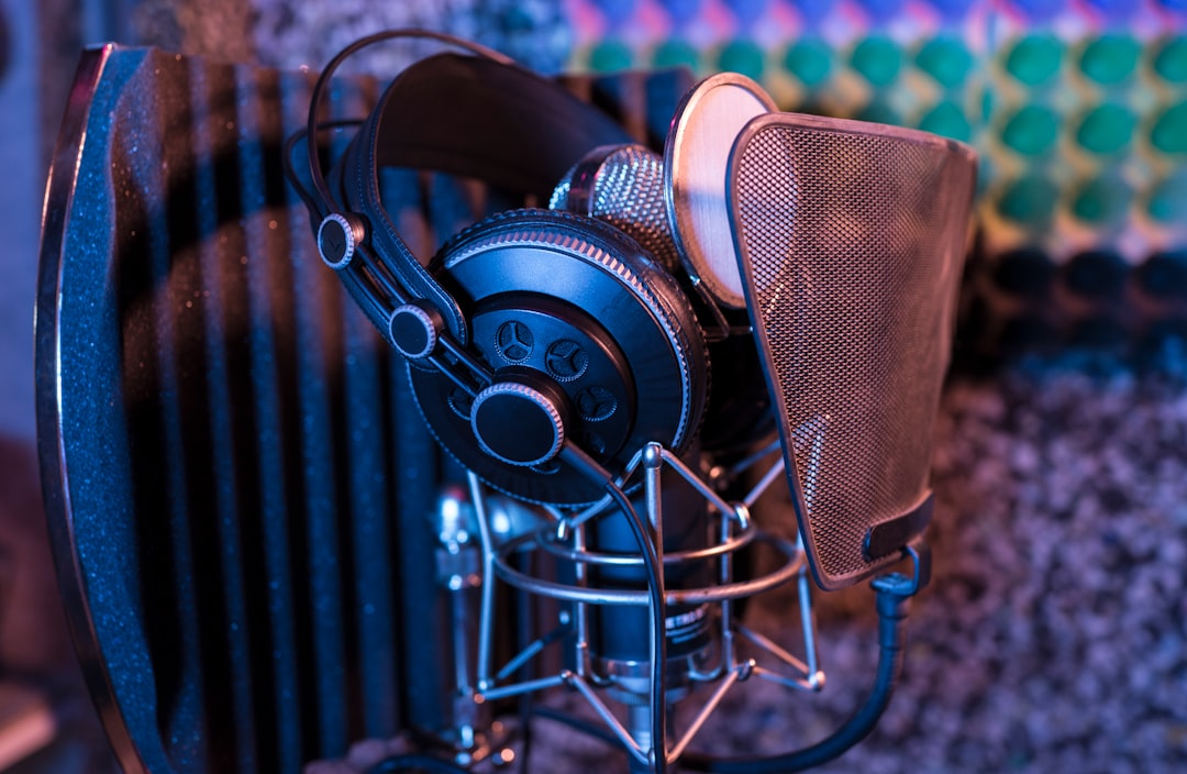 Professional home studio setup for Spanish voice over recording with acoustic treatment and microphone